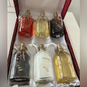 Glass Bottles with Gold Detail filled with essential oils in a Set of 6